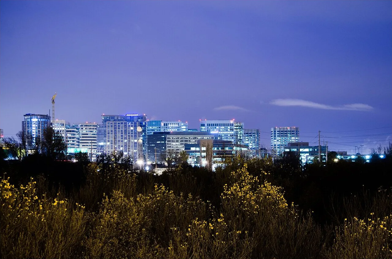 Downtown San Jose skyline glowing at dusk in Silicon Valley